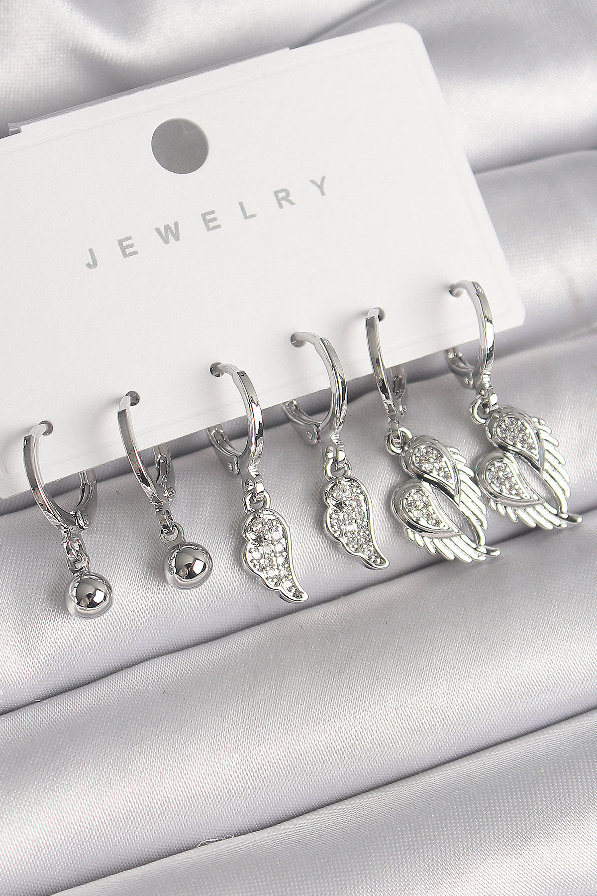 Pirinç Gümüş Renk Sallantı Zirkon Taşlı Kanat Model Topçuk Detay Kadın Küpe Seti